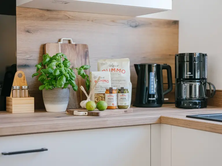 Fully equipped kitchen with modern appliances at Stay Eden MOONSTONE GREEN, a Ramstein TLA apartment.