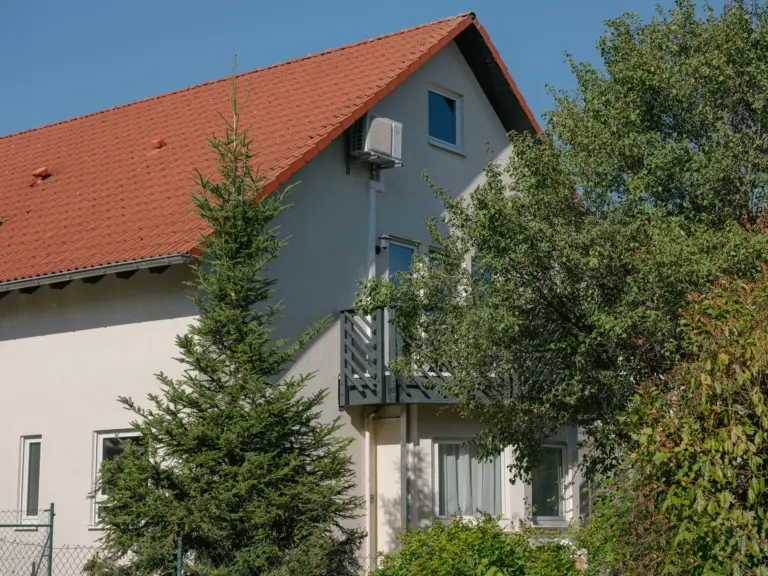 Exterior view of the Stay Eden MOONSTONE GREEN apartment building in Ramstein, showing the modern and well-maintained property.