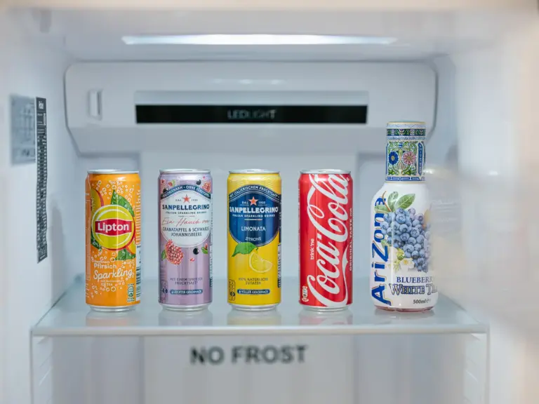 Pre-stocked side-by-side fridge in the kitchen at Stay Eden MOONSTONE GREEN, a TDY apartment near Ramstein.