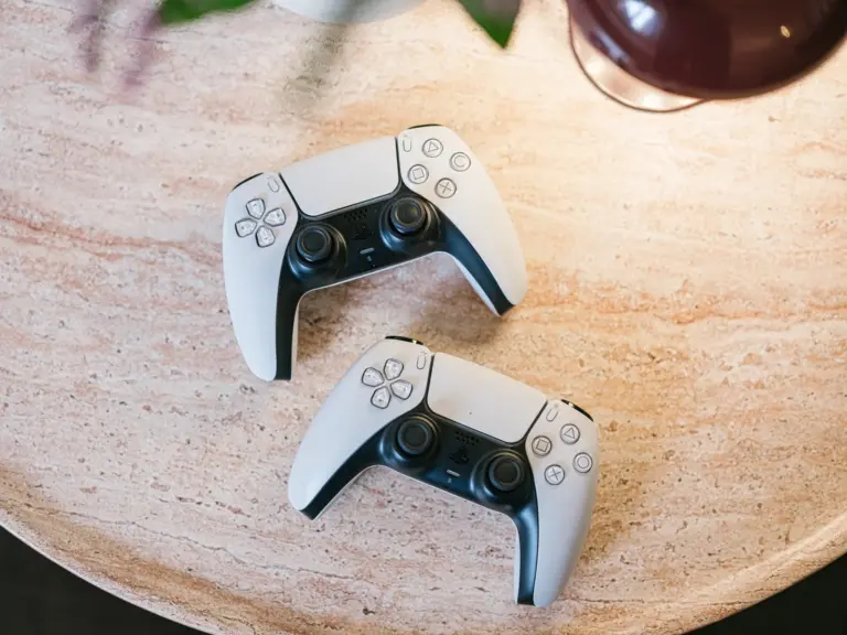 PlayStation 5 controller on living room sideboard at Stay Eden TOPAZ BLUE near Ramstein Air Base.