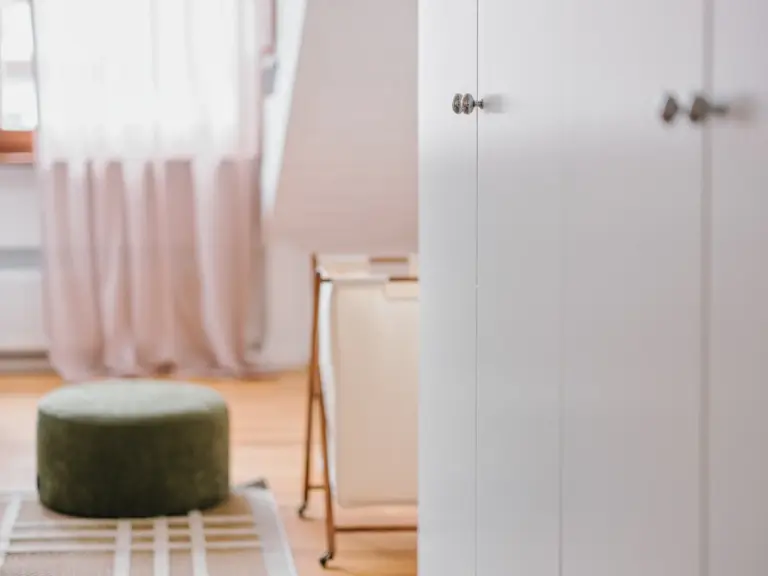 Master bedroom closet with ample storage at Stay Eden TOPAZ BLUE near Ramstein Air Base.