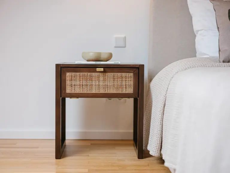 Second bedroom with stylish nightstand and king-size bed at Stay Eden TOPAZ BLUE near Ramstein Air Base.