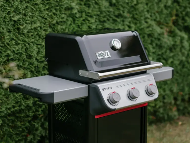 Weber grill in outdoor area with modern setup at Stay Eden TOPAZ BLUE near Ramstein Air Base.