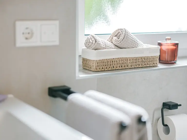 Stylish bathroom with modern fixtures and soft lighting at Stay Eden TOPAZ GREEN near Ramstein Air Base.