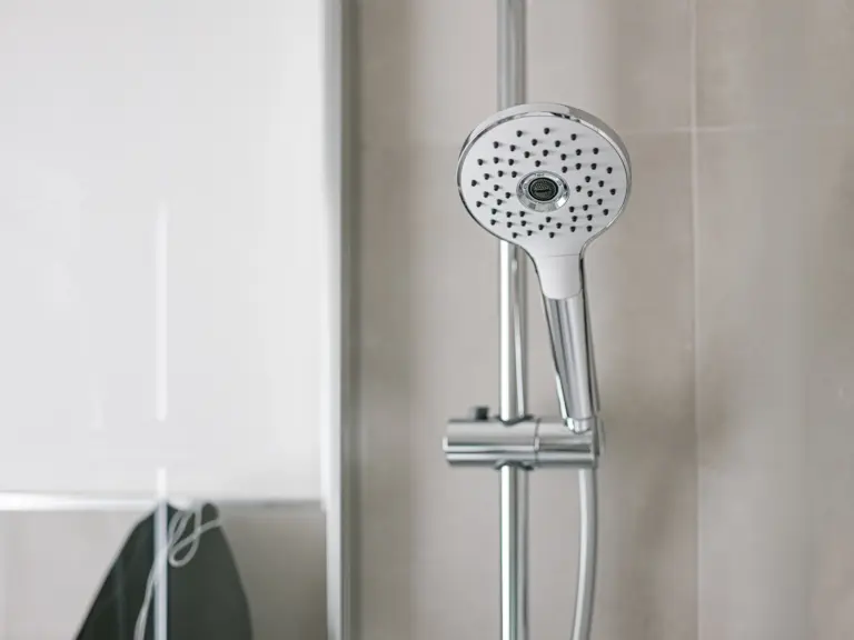 Walk-in shower with modern tiles and glass enclosure at Stay Eden TOPAZ GREEN near Ramstein Air Base.