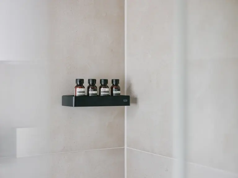 Bathroom with premium bath essentials and soft lighting at Stay Eden TOPAZ GREEN near Ramstein Air Base.