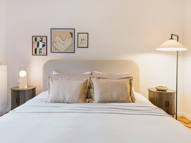 Front view of main bedroom with king-size bed and soft lighting at Stay Eden TOPAZ GREEN near Ramstein Air Base.