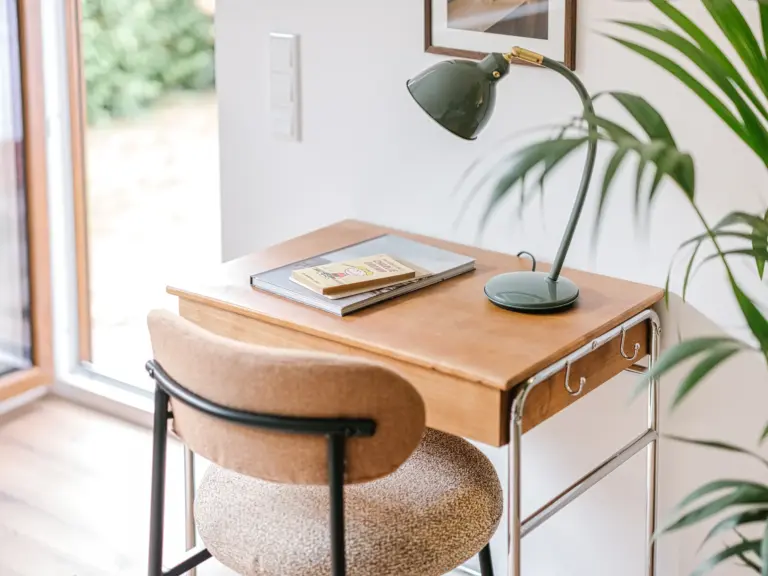 Dedicated workspace with desk and chair at Stay Eden TOPAZ GREEN near Ramstein Air Base.