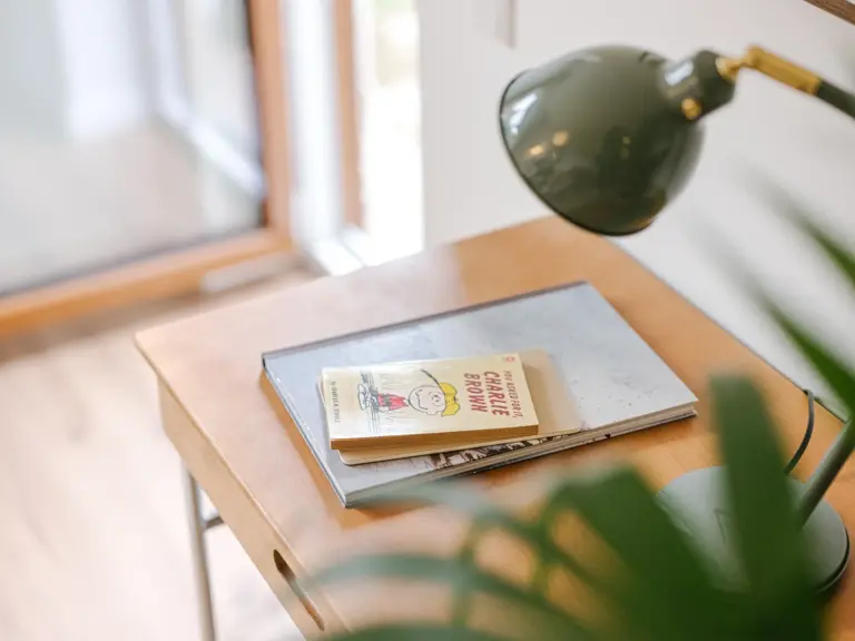 Workspace with desk, chair and books at Stay Eden TOPAZ GREEN near Ramstein Air Base.