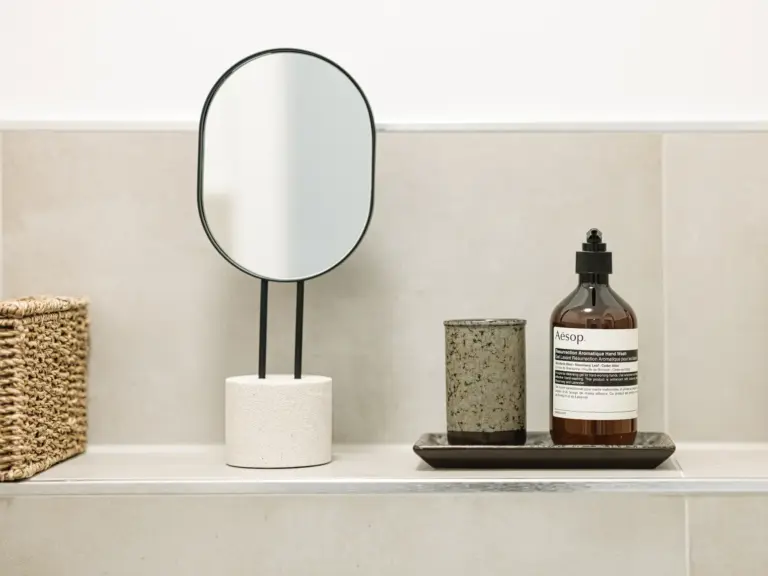 Half bath with modern decor and bright tiles at Stay Eden TOPAZ GREEN near Ramstein Air Base.