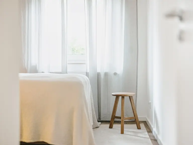 View of second bedroom with queen-size bed and soft lighting at Stay Eden TOPAZ GREEN near Ramstein Air Base.