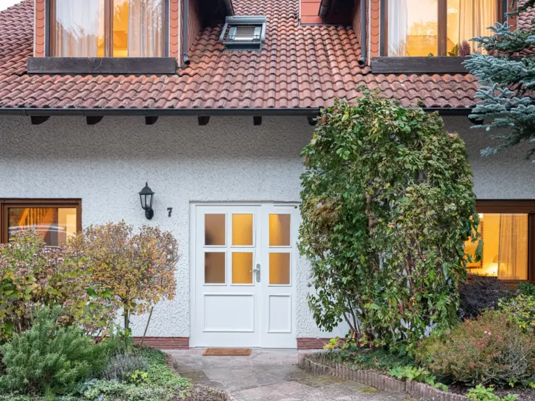 House entrance door with clean modern design at Stay Eden TOPAZ BLUE near Ramstein Air Base.