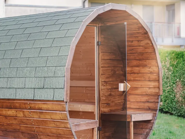 Side view of the Finnish sauna at the Stay Eden SAPPHIRE BLUE apartment in Ramstein, showing wooden interior details and clean design.