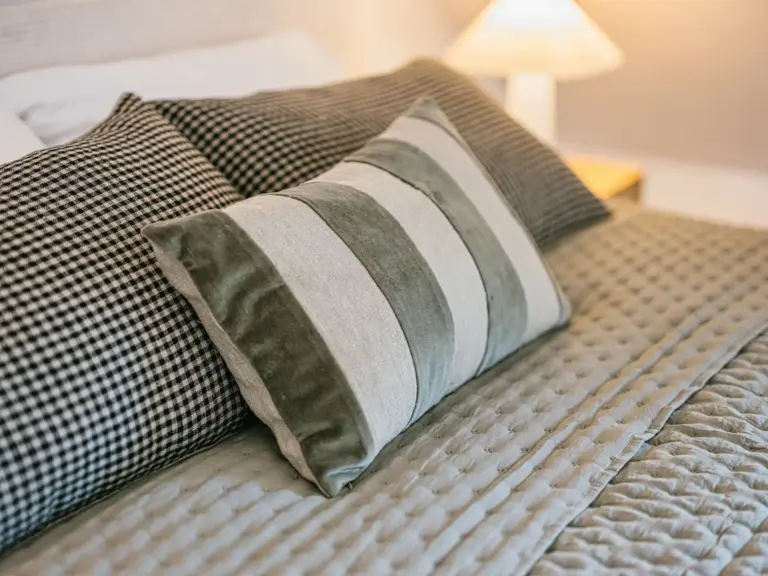Stay Eden SAPPHIRE BLUE master bedroom with cozy pillows ramstein tdy tla apartment